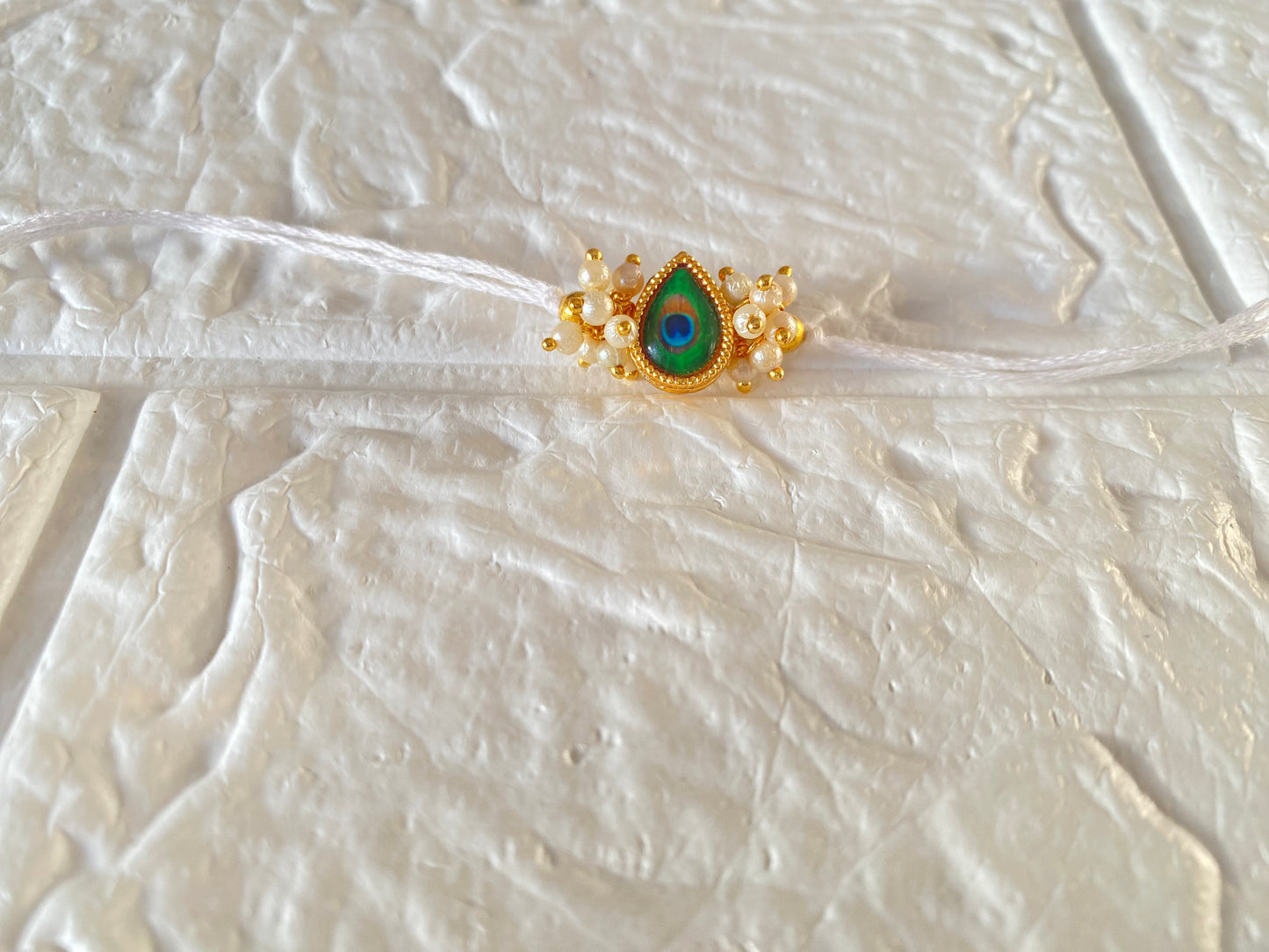 Beautiful Handmade Morpankh Rakhi (Pack of 12)
