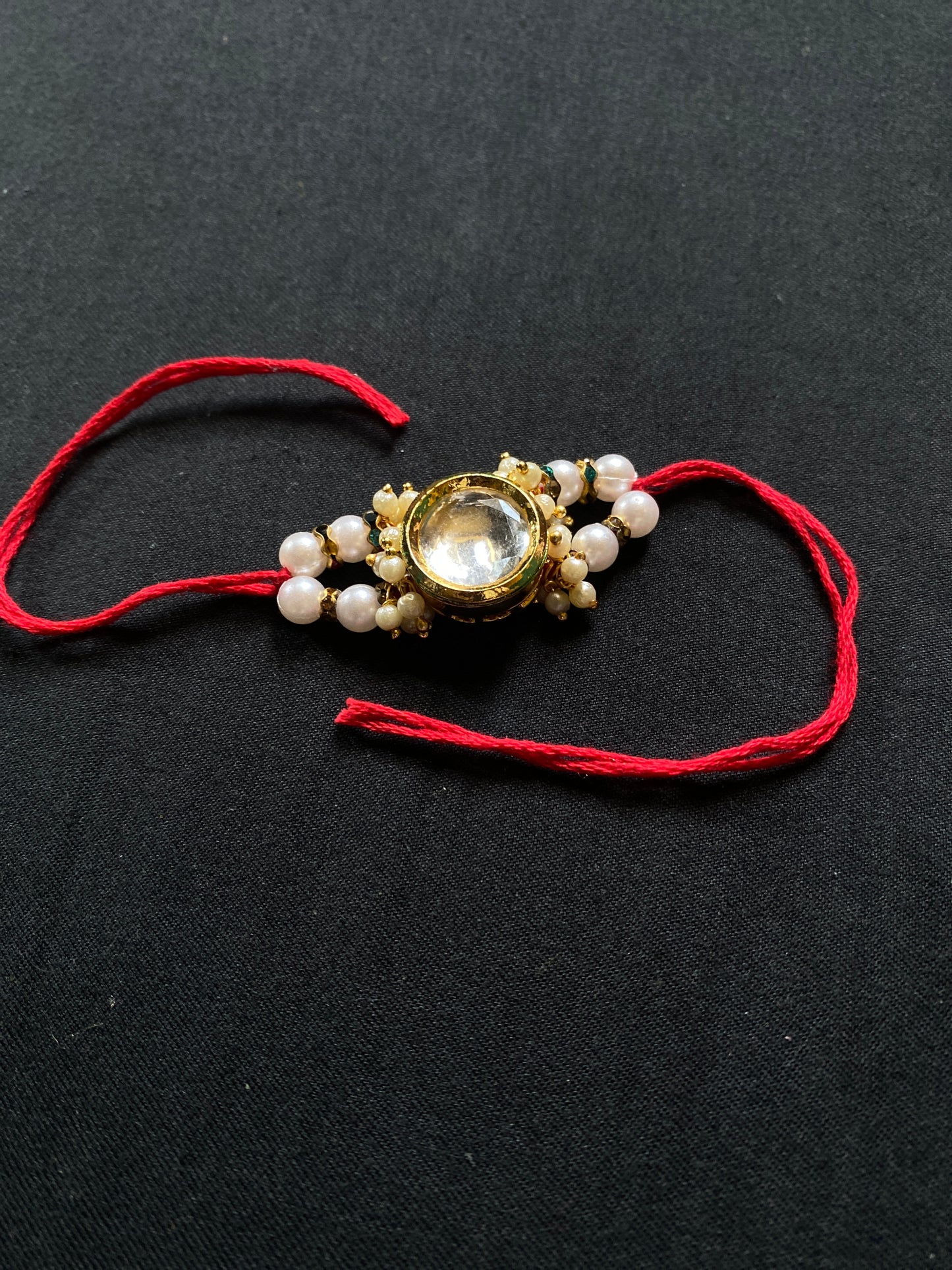 Handmade white pearl Rakhi
