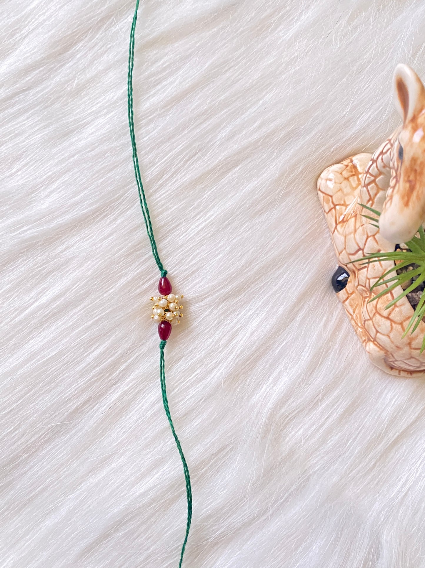 Elegant Pearl Bead Rakhi (Pack of 12)