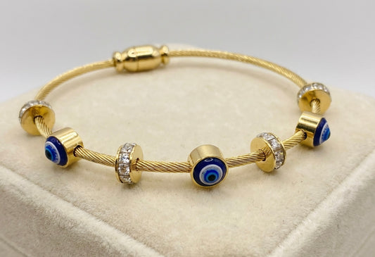 Gold evil eye charm bangle bracelet