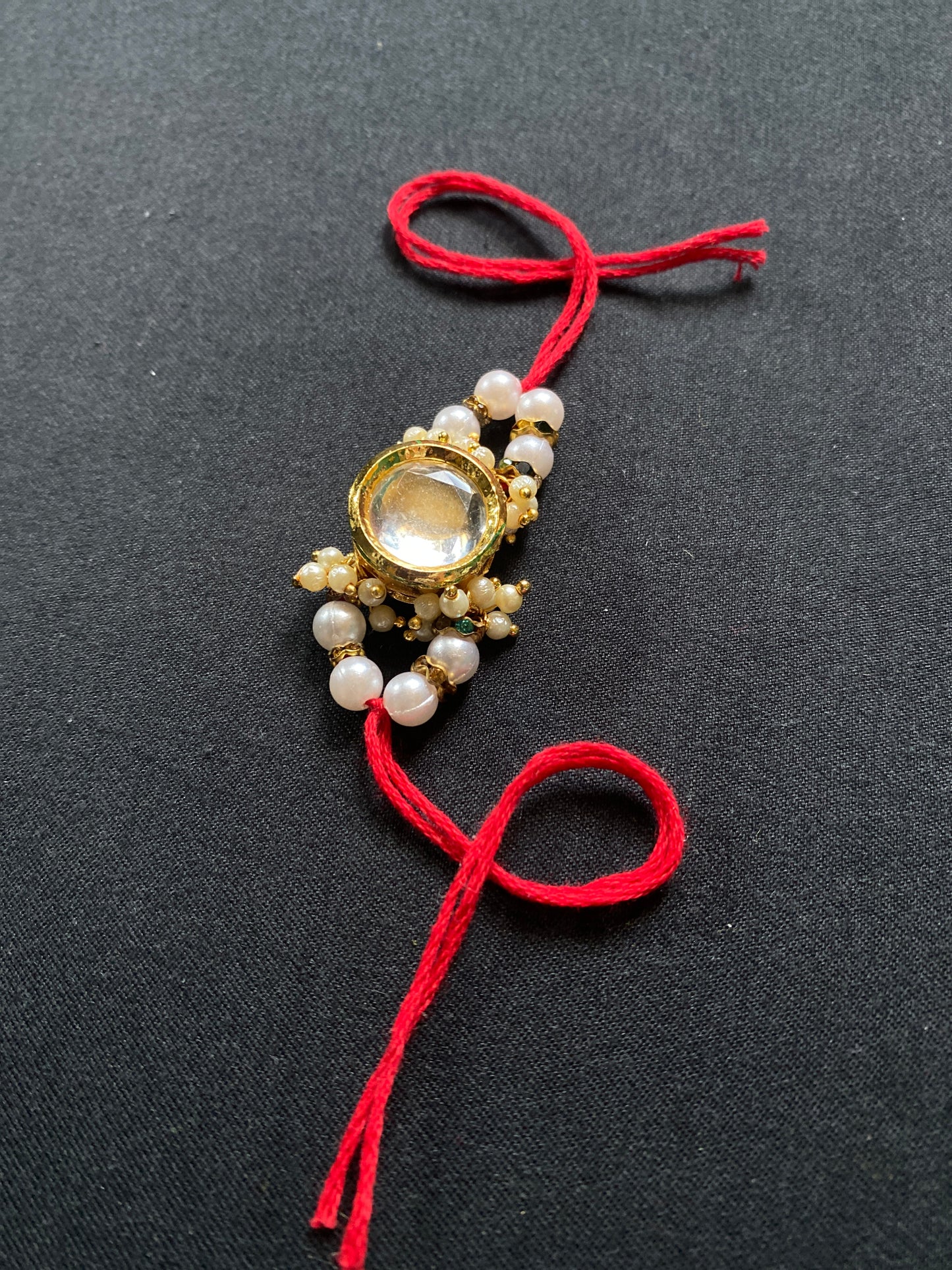 Handmade white pearl Rakhi