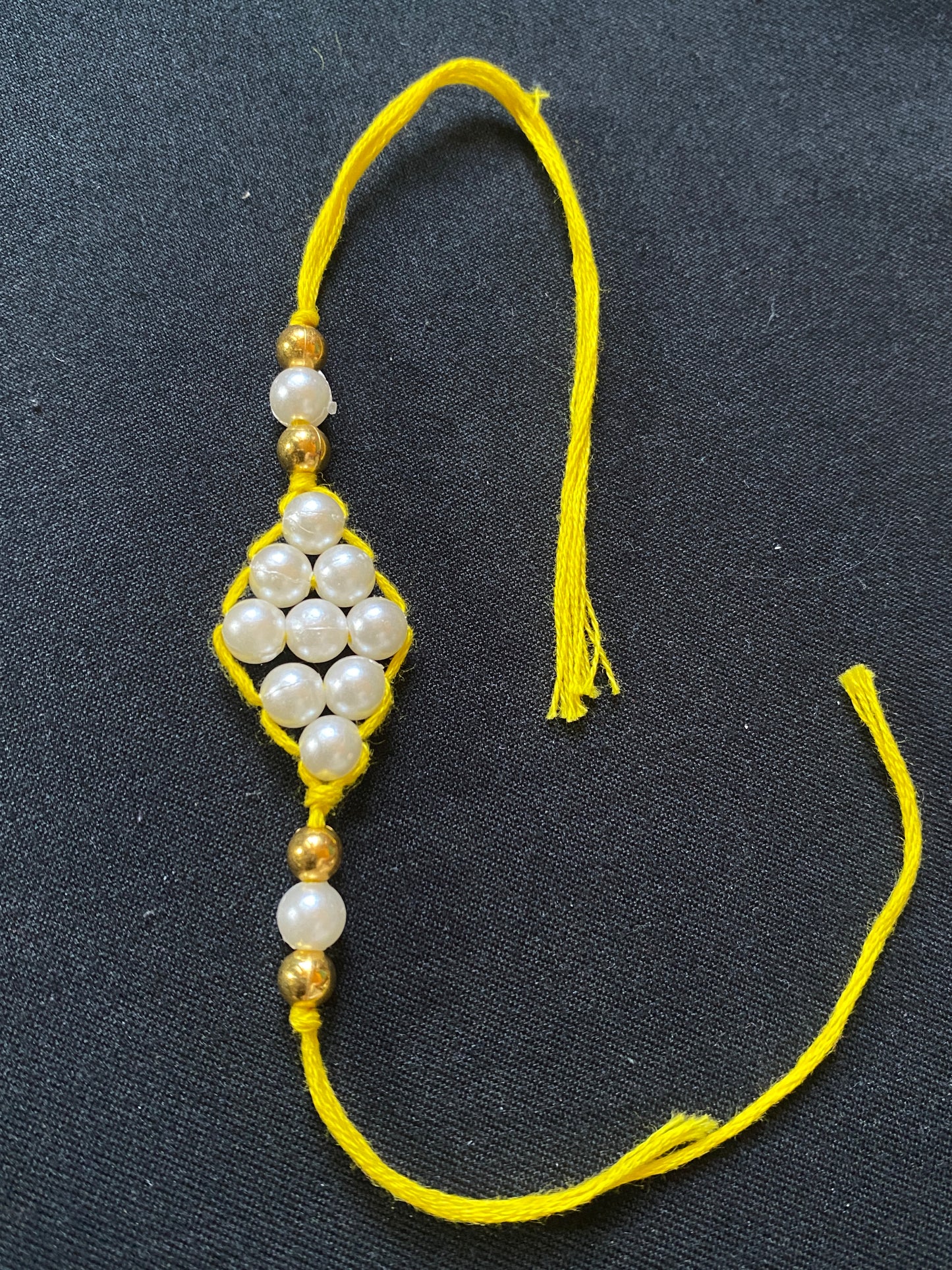 Simple beaded Rakhi (Dozen price)