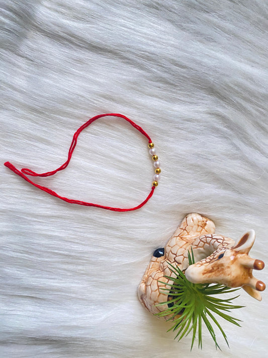 Gold and White Bead Rakhi (Pack of 12)