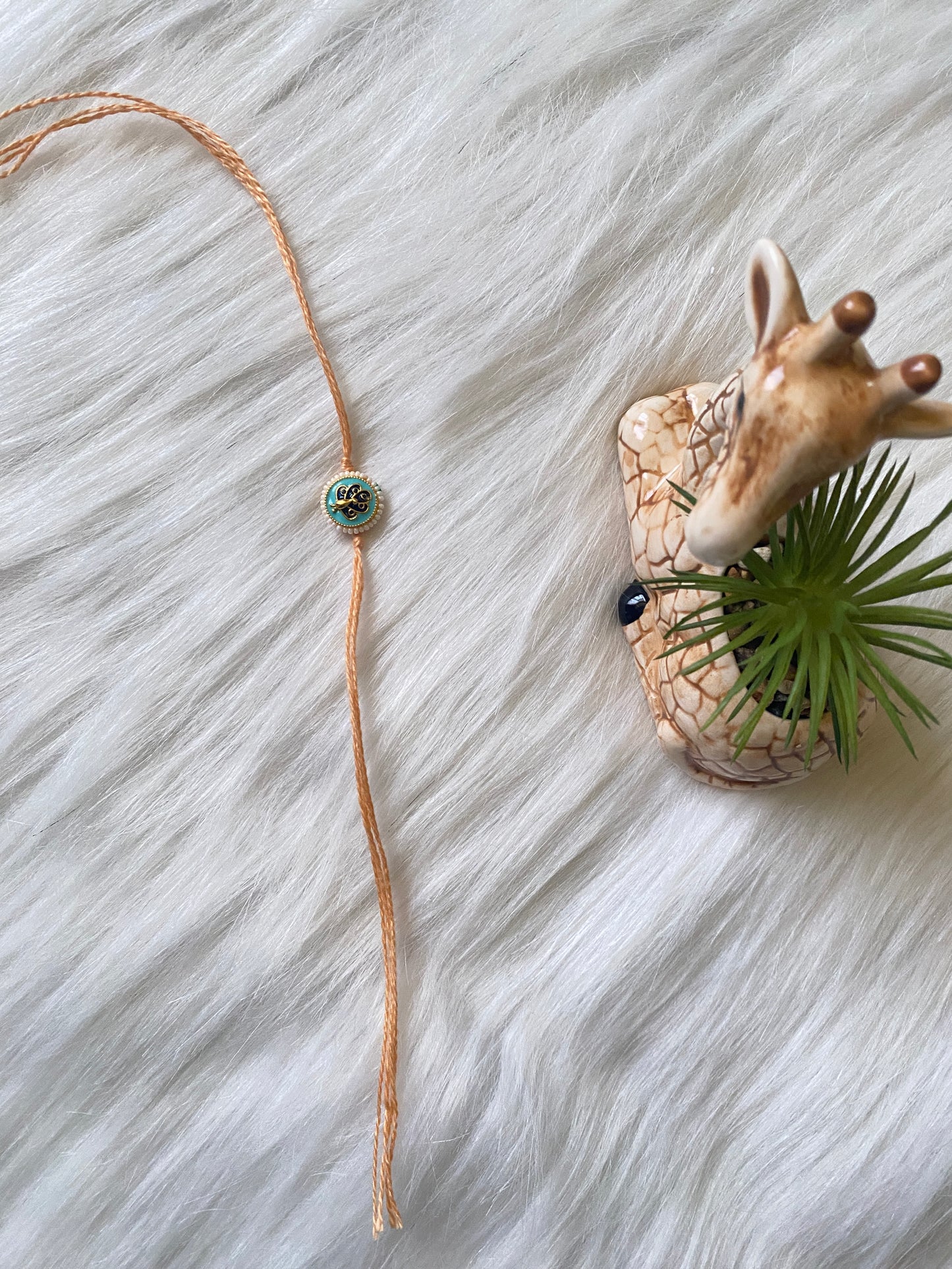🦚 Minimal Peacock Charm Rakhi (Pack of 6