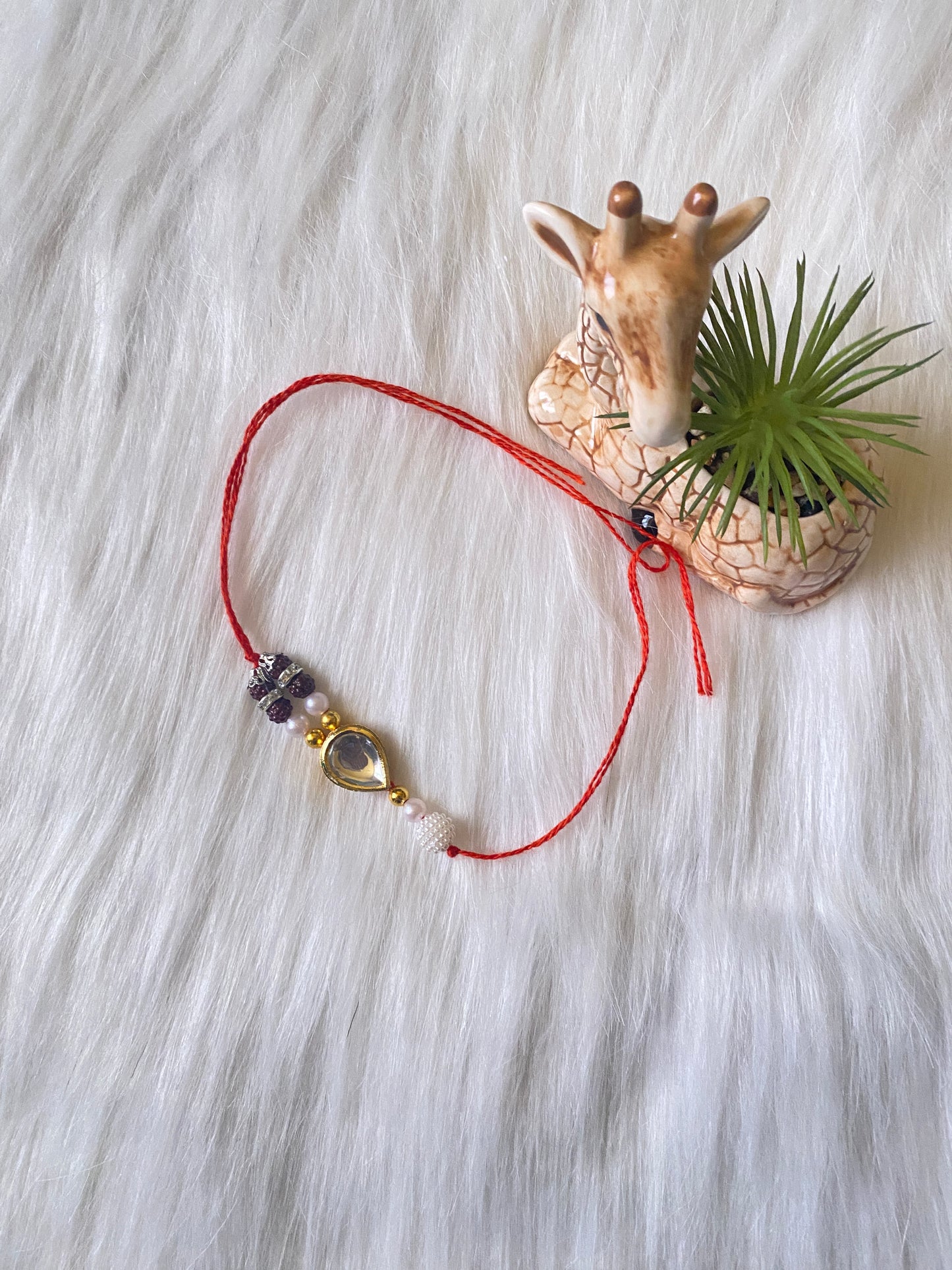 Sacred Rudraksha Rakhi with Red Thread & Elegant Beads (Pack of 2)