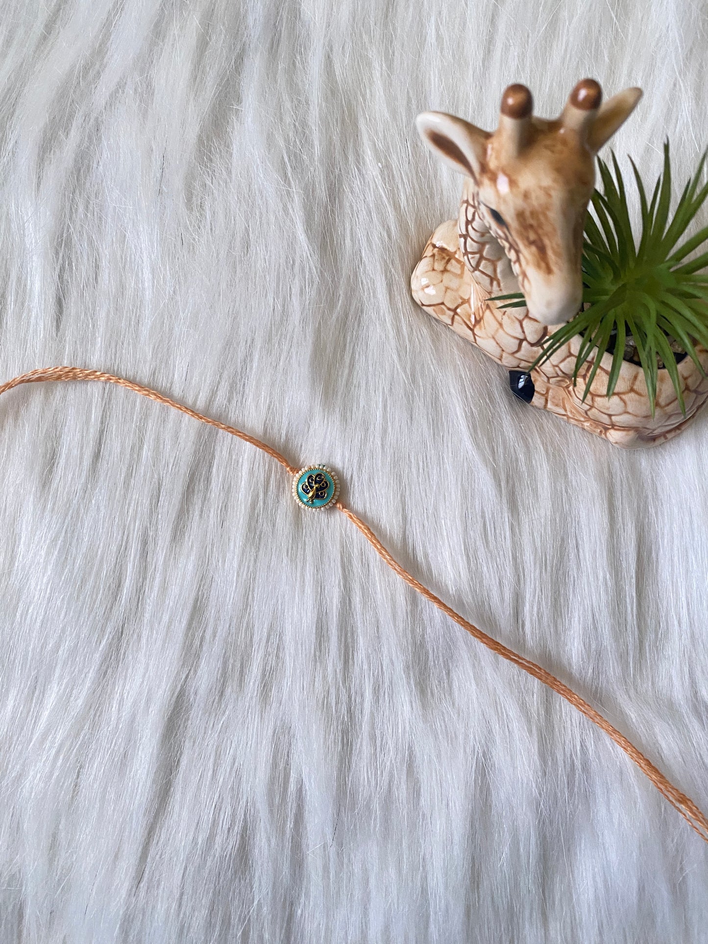 🦚 Minimal Peacock Charm Rakhi (Pack of 6
