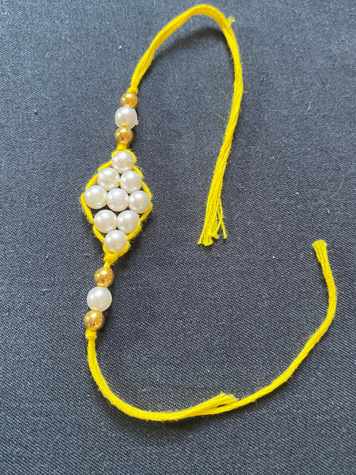 Simple beaded Rakhi (Dozen price)