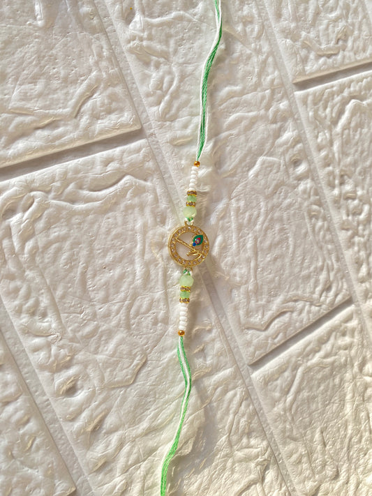 Handcrafted Krishna Feather Charm Rakhi
